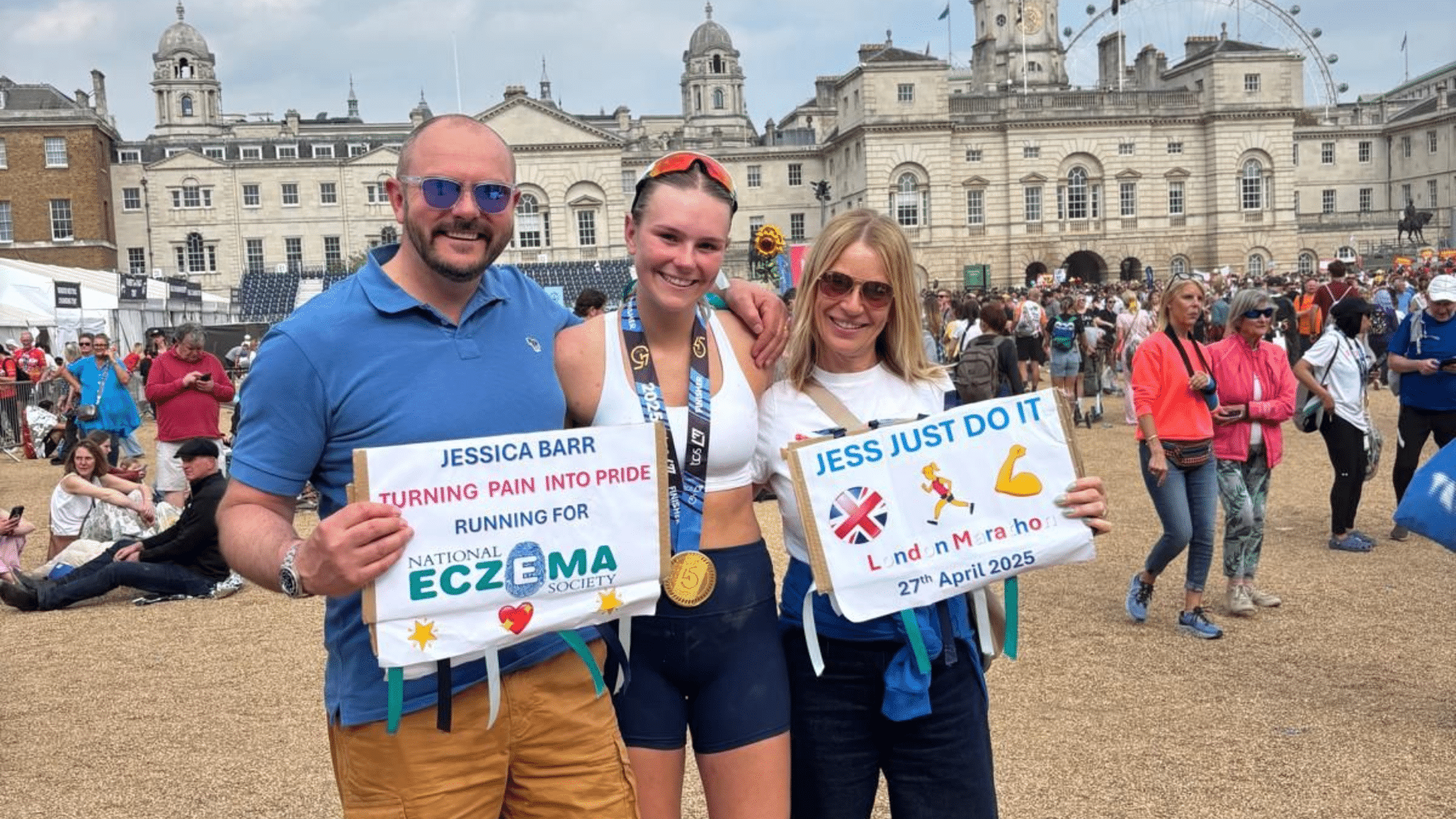 A picture of Jess and her family after Jess ran the London Marathon