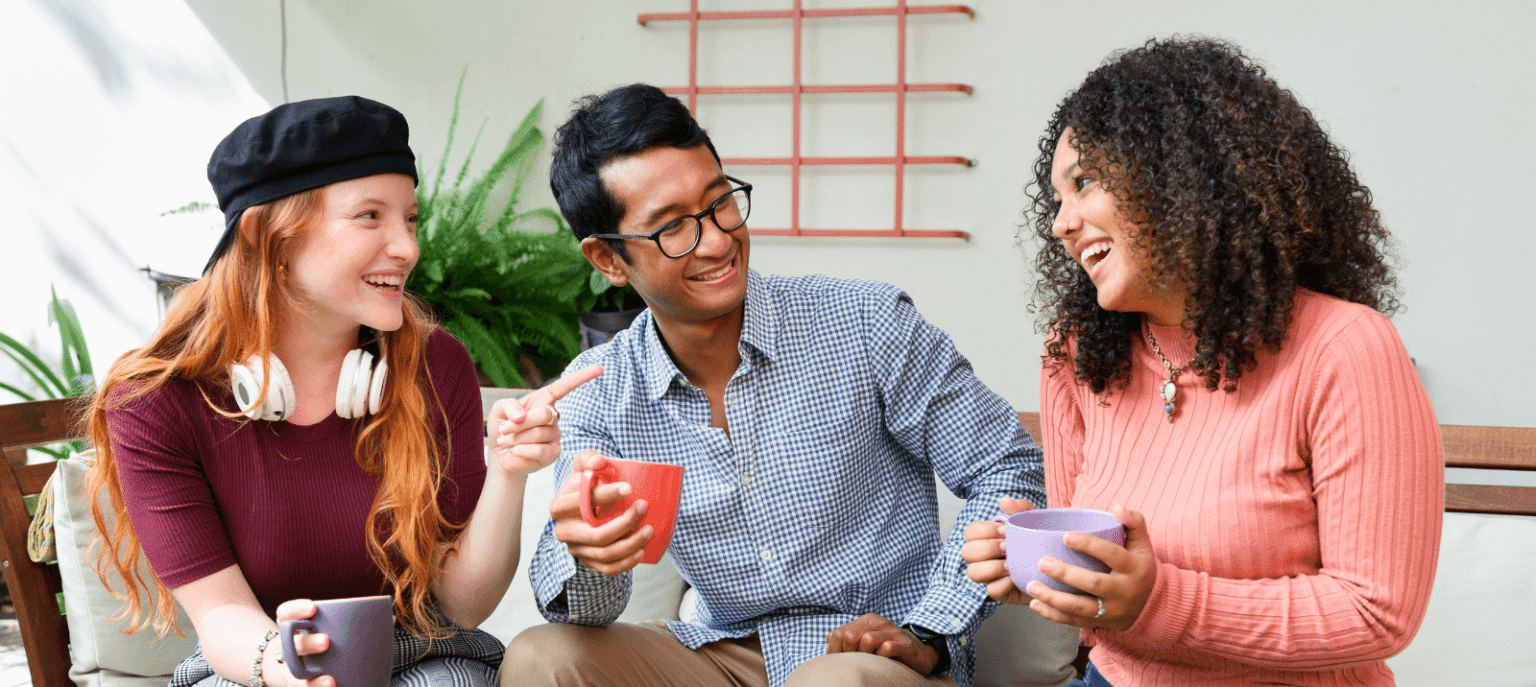 Three people having a conversation